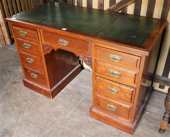 Victorian mahogany nine drawer desk